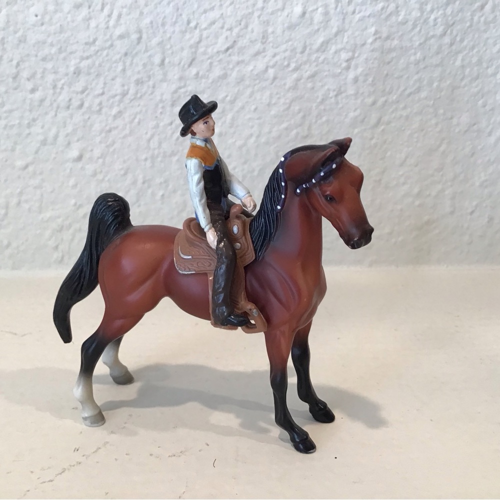 Breyer Saddlebred western rider and saddle #5202. New condition missing reins.